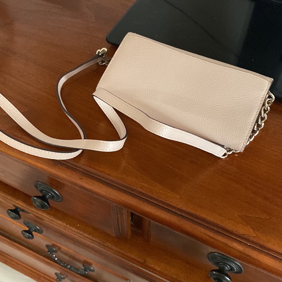 New. Kate spade purse.  Flowers on side.  Very pretty.  Strap. - Picture 9 of 9